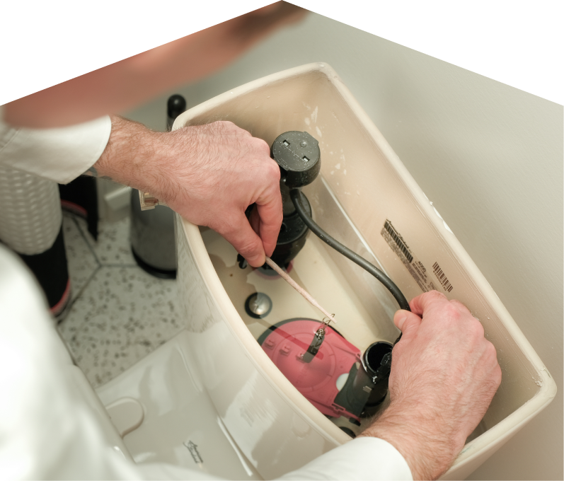 Mersey plumbing specialist adjusts internal components of a toilet tank, with tile flooring visible in the background. Mersey plumbing specialist adjusts internal components of a toilet tank, with tile flooring visible in the background.